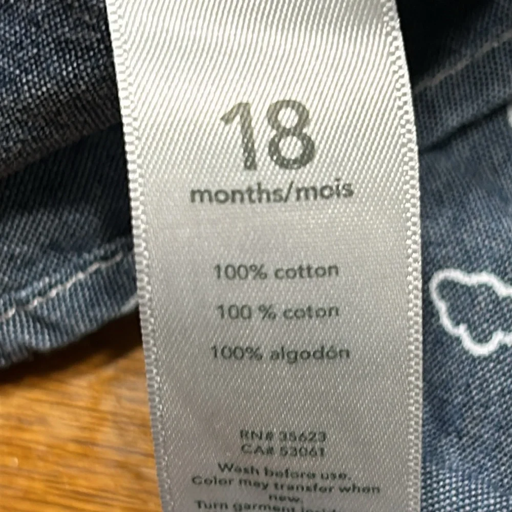 Carter’s blue and white long sleeve shirt. Excellent condition. Size 18 Months.